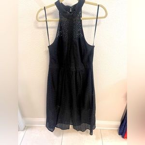 Black midi halter dress with sheer overlay